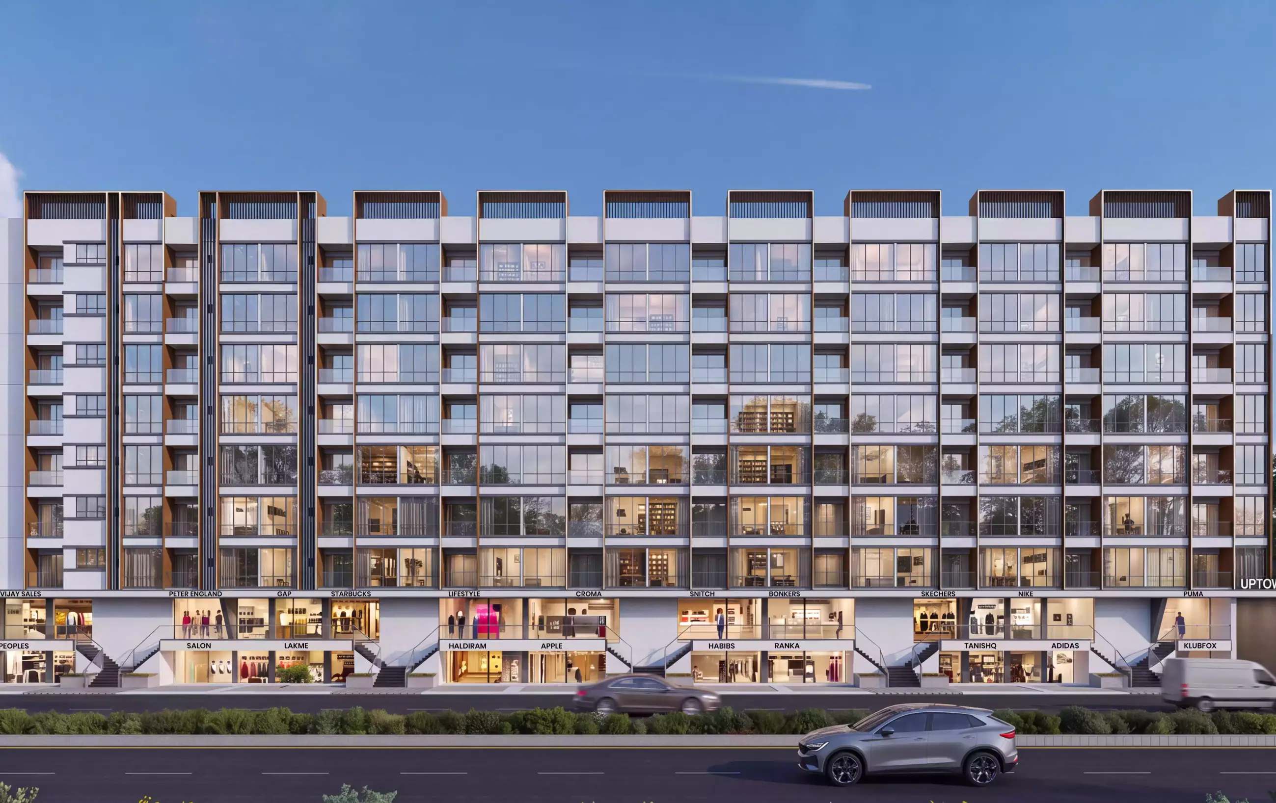 Uptown Plaza by GreeNest - front elevation by day, seven residential floors over the shopfront band