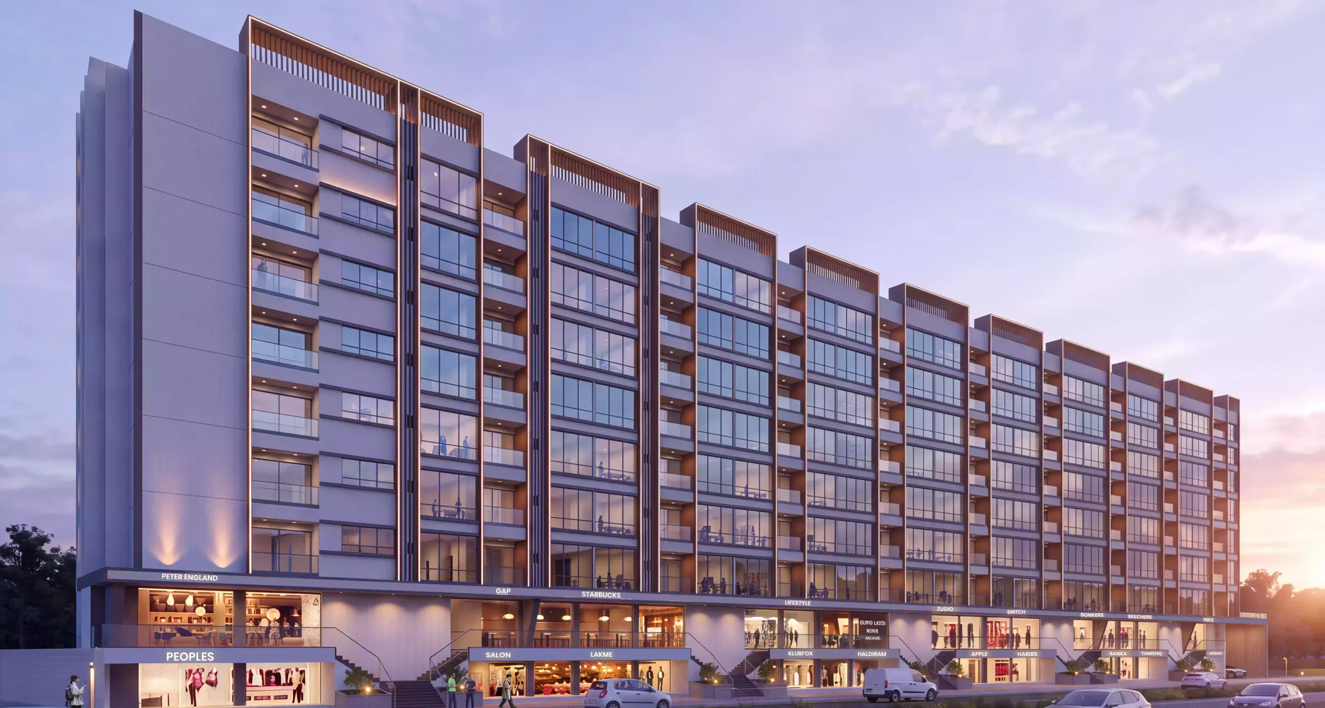Uptown Plaza Ambegaon - eye-level view of the retail promenade in the evening